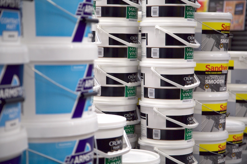 Stacked tubs of white paint
