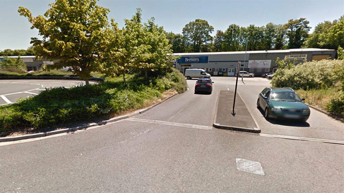 With Morrisons petrol station on your right, take the next right to find the store directly in front.