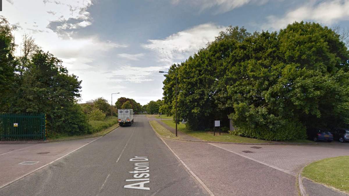 Traveling towards the roundabout along Alston Drive, the store is on the right