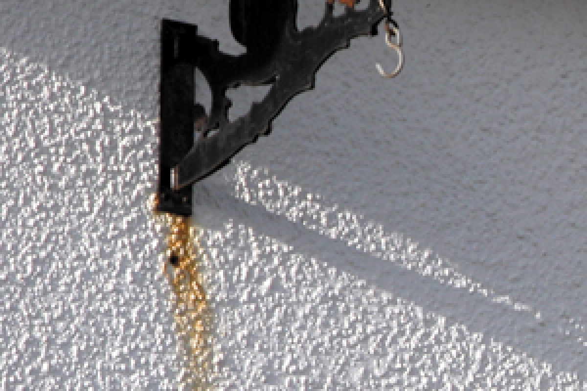 Bleeding - staining or discoloration from a previous coating
