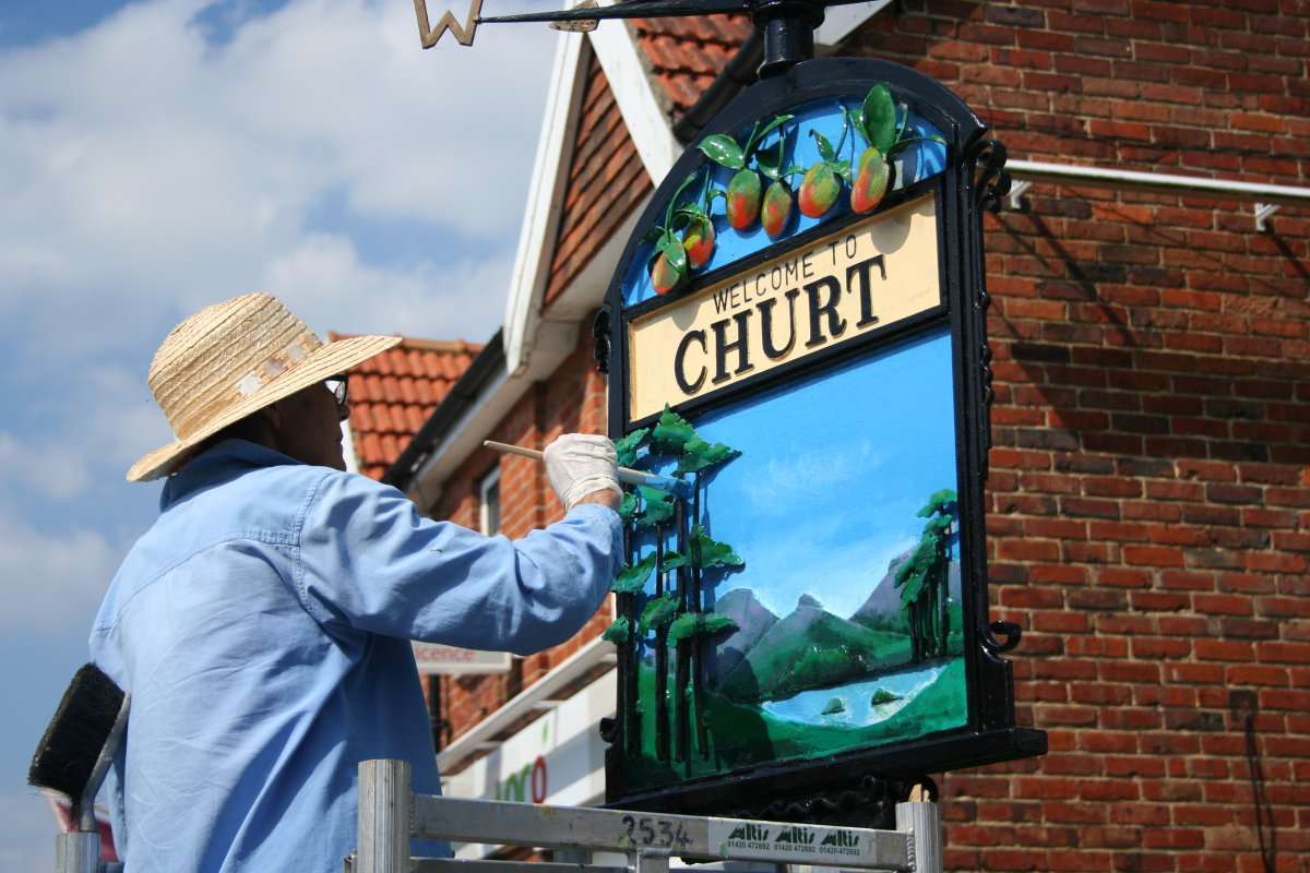 The Churt Vilage sign transformed with the help of Brewers Decorator Centres