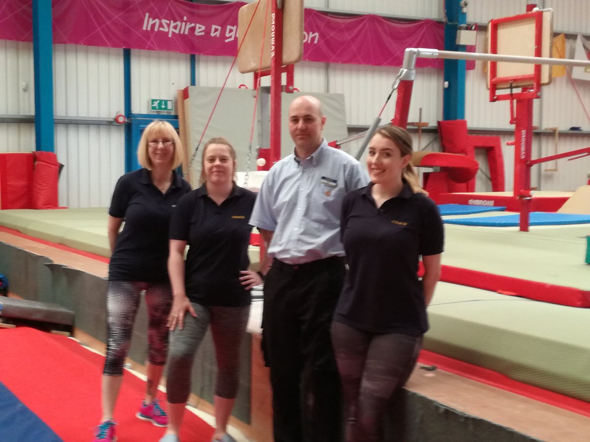 Brewers Northampton branch manager Stuart Bell with the NCAAC Gymnastics coaches