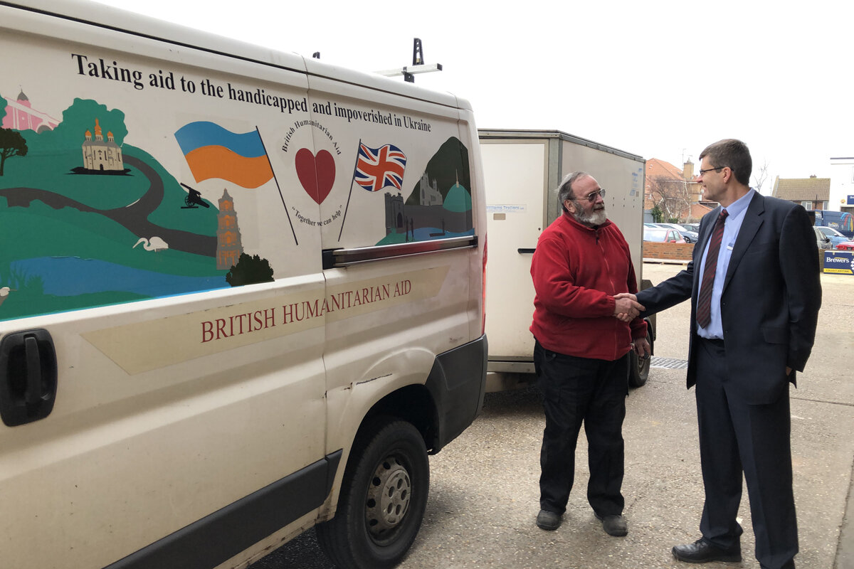 Phil from BHA receive the uniforms from Darren at Brewers Eastbourne