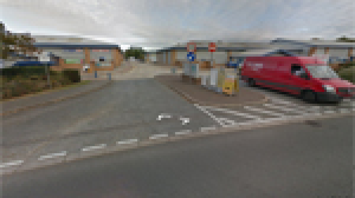 Take the first on Headley RD E just before Screwfix into the Industrial Estate and continue straight towards Brewers.