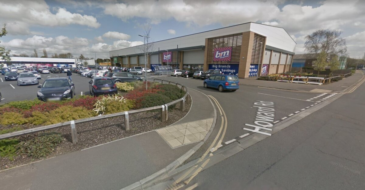 Turn left to enter Quora Retail Park and continue past B&M