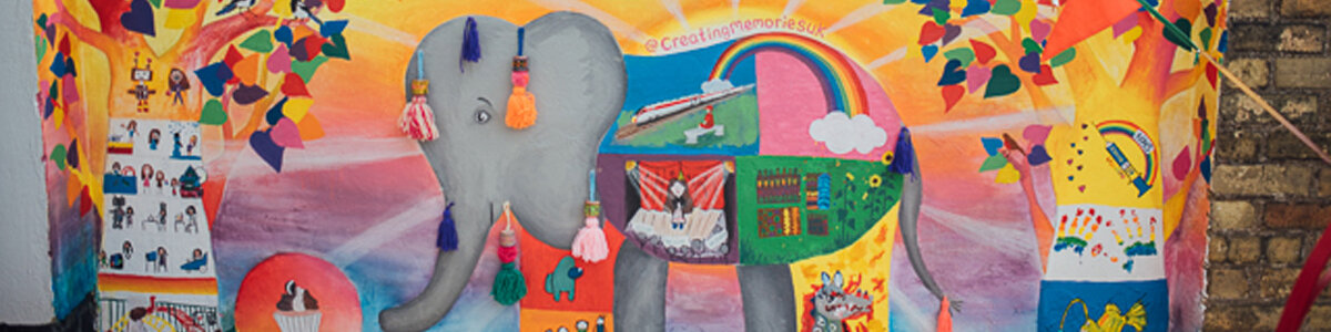 Local Children Help Create a Mural of Joy