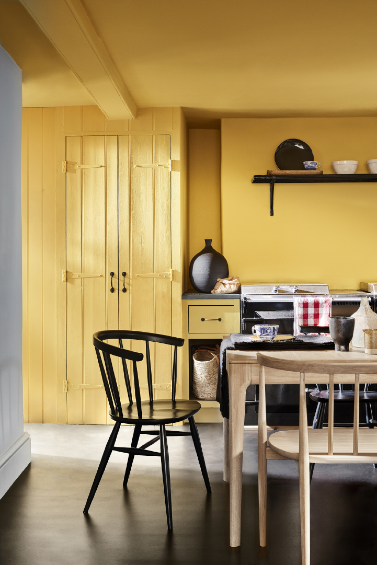 Ceiling: Giallo 337 in Absolute Matt Emulsion, Walls: Giallo 337 in Intelligent Matt Emulsion, Cupboard: Giallo 337 in Intelligent Satinwood, Left Wall: Bone China Blue - Faint 325 in Intelligent Matt Emulsion.