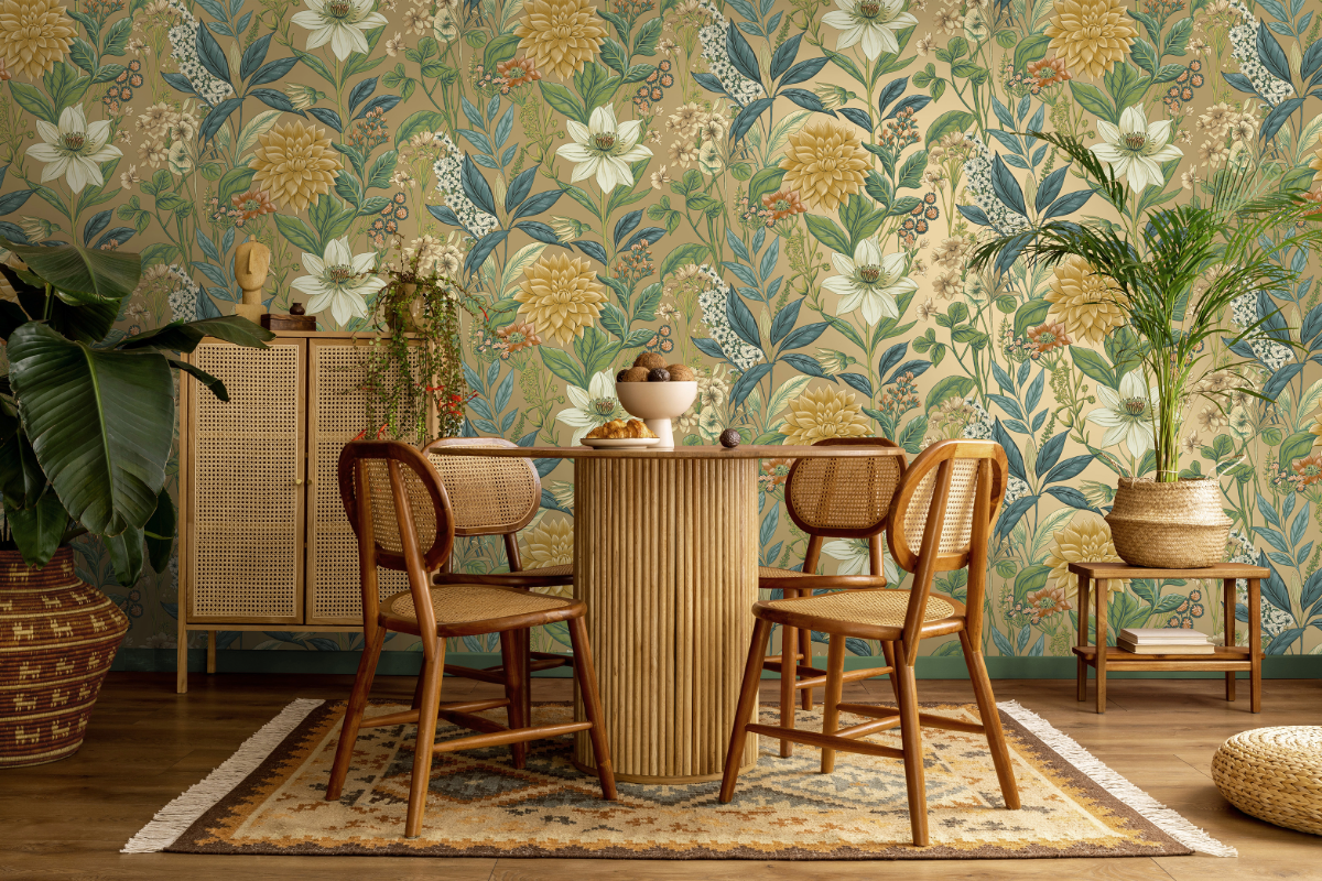 gold, blue and white flower wallpaper behind table and chairs