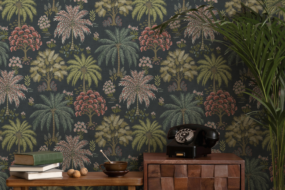 Green and pink botanical trees wallpaper with table, books and rotary phone