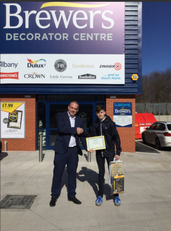 Owen Abbishaw collecting his Brewers Decorator of the Term award at Brewers Leeds