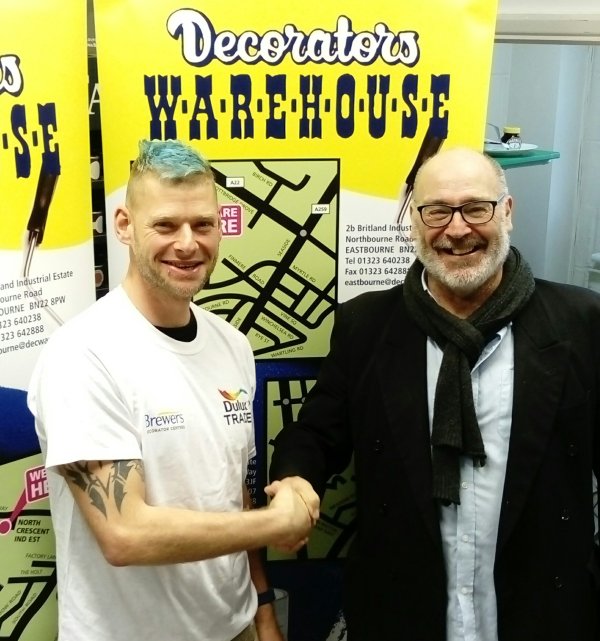 Karl Wilkinson from Decorators Warehouse Hailsham donated paint to Paul Henderson