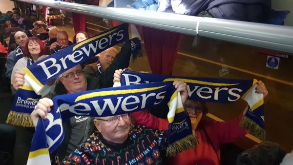 Football fans on the coach journey to watch Tranmere Rovers vs Morecambe